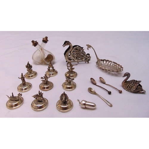 481 - A quantity of hallmarked silver and white metal to include a condiment set, menu holders and condime... 