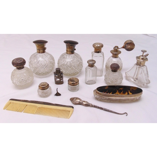 483 - A quantity of hallmarked silver and white metal to include a pair of silver mounted scent bottles, a... 