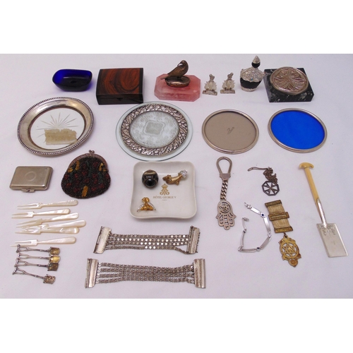 484 - A quantity of hallmarked silver and white metal to include coasters, scent bottles, and a Mappin and... 