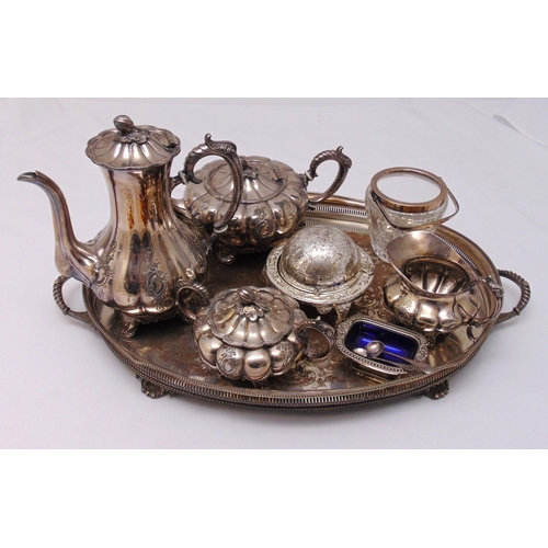 495 - A quantity of silver plate to include an oval gallery tray, a teaset and condiments