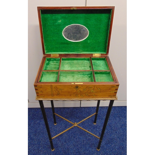 9 - A continental rectangular jewellery casket inlaid with copper and brass decoration, the hinged cover... 