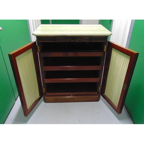 1 - A 19th century rectangular mahogany marble top chiffonier, the double doors with pleated silk centre... 