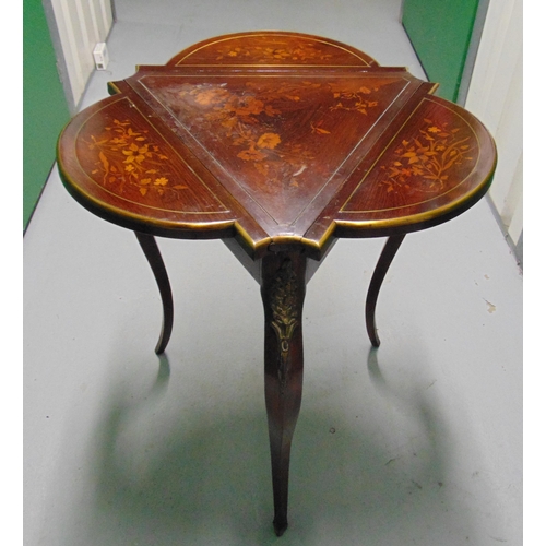 13 - A 19th century triangular drop flap table, the hinged cover opens to reveal a mirror and material li... 