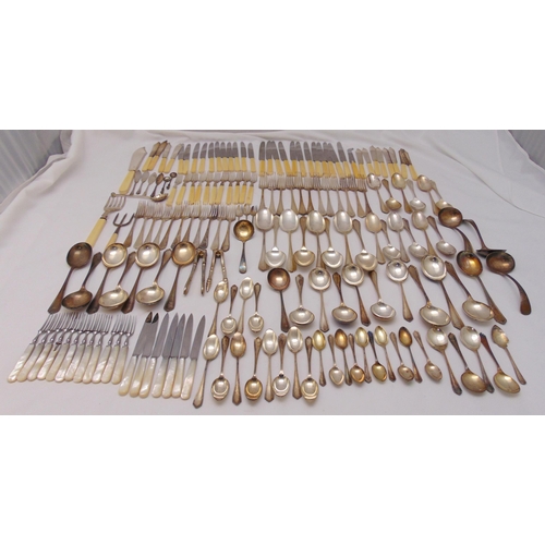 419 - A quantity of silver plated flatware to include knives, forks, spoons and a serving knife and fork