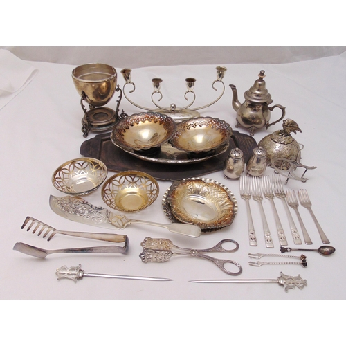 422 - A quantity of silver plate to include teapot, bonbon dishes, condiments and flatware