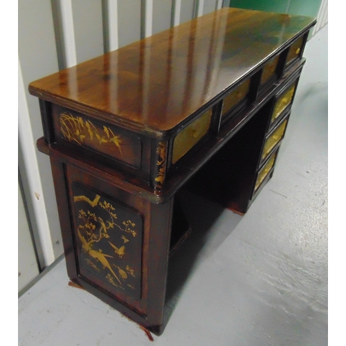 5 - A Chinese rectangular hardwood kneehole desk with seven drawers decorated with painted panels, the s... 