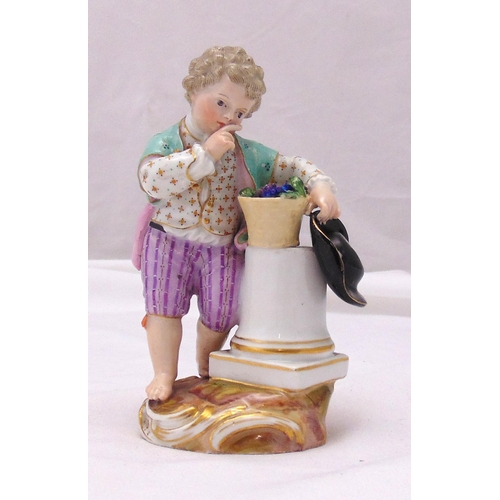 175 - A Meissen figurine of a boy in 18th century costume holding his hat on raised naturalistic base, mar... 