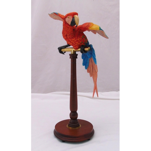 183 - Richard Roberts, Border Fine Arts limited edition of a Maccaw on turned wooden and brass stand, 622 ... 