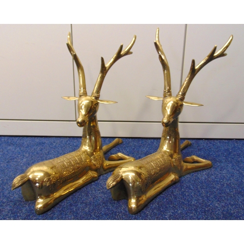 232 - A pair of recumbent brass antelopes, 52 x 61 x 27cm each