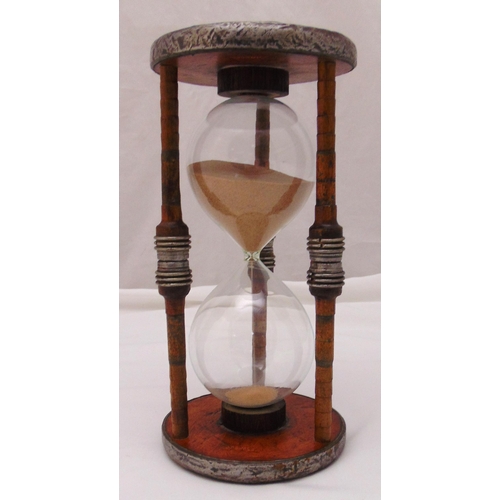 244 - A 19th century industrial bobbin converted to an hourglass sand timer, 34cm (h)