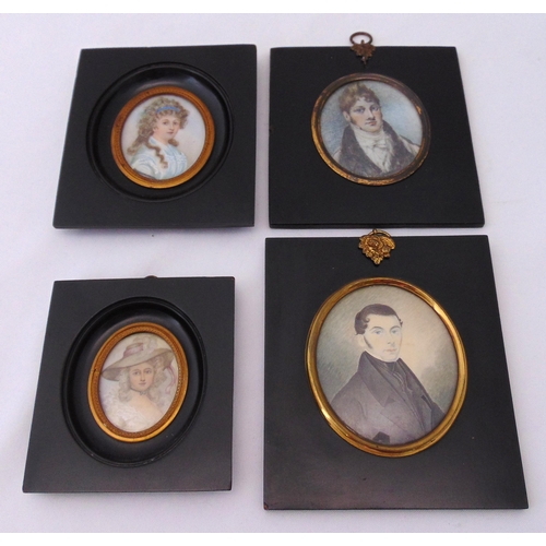 252 - Four 19th century framed miniature portraits of two gentlemen and two ladies all in original frames