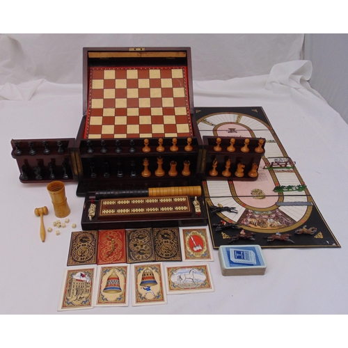 264 - A late Victorian mahogany games compendium, the rectangular case hinged to reveal wooden chess piece... 