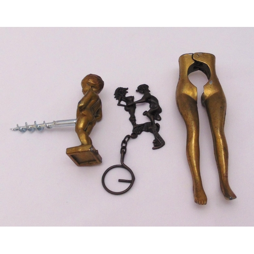 267 - A quantity of erotica to include a brass nutcracker in the form of ladies legs, a corkscrew with put... 