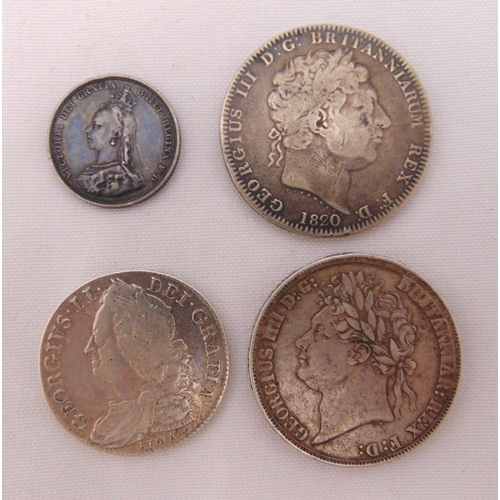 285 - A George II silver half crown 1746, a George III  silver Crown 1820, a George IV silver crown 1821 a... 