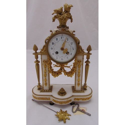 294 - A French gilt metal and white marble mantle clock, two train movement, the white enamel dial with Ar... 