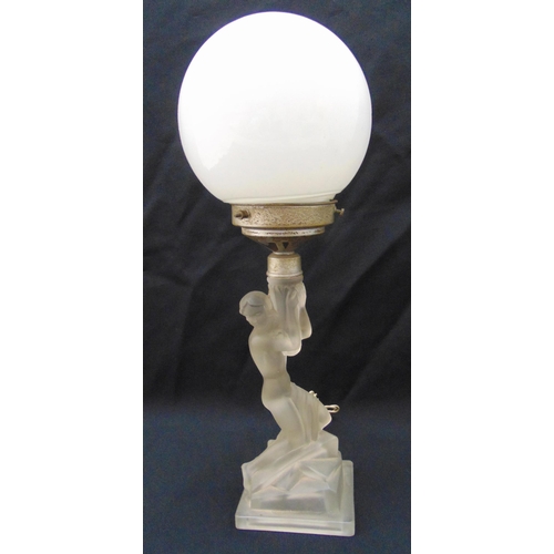 30 - An Art Deco frosted glass figural table lamp on stepped rectangular base with white glass globular s... 