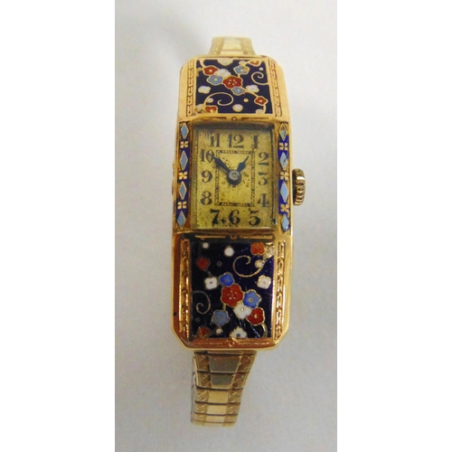 302 - 18ct gold and champlevé ladies wristwatch on expanding gold plated bracelet