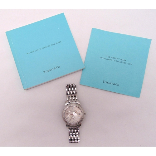 305 - Tiffany and Co. gentlemans stainless steel wristwatch, date and second aperture, to include paperwor... 