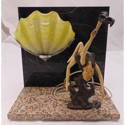 32 - An Art Deco style lamp mounted on a marble base with an applied stylised figurine of a dancing lady,... 