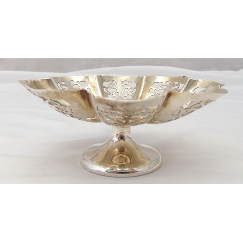 377 - A hallmarked silver scalloped edge bonbon dish with scroll pierced sides on raised circular base, Sh... 