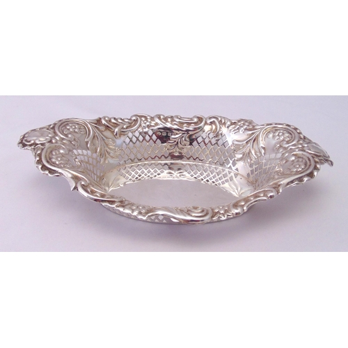 380 - A Victorian hallmarked silver shaped oval pierced and chased sweetmeat dish, Birmingham 1899, approx... 