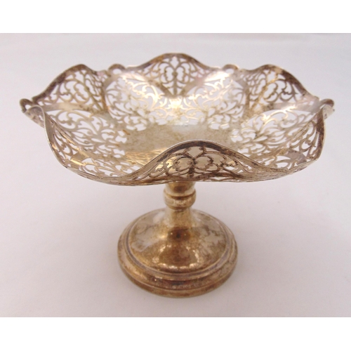 382 - A hallmarked silver pierced bonbon dish on raised circular base, Birmingham 1936, approx total weigh... 