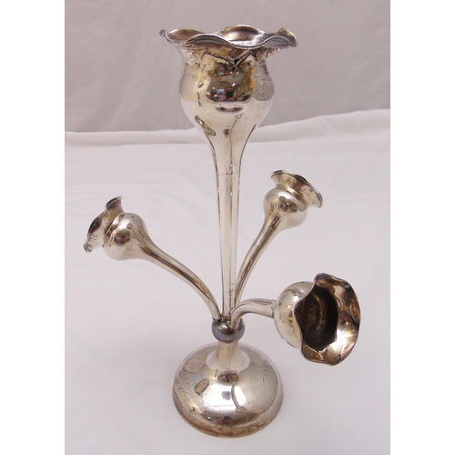 392 - A hallmarked silver centre piece with central floral vase flanked by three matching detachable vases... 