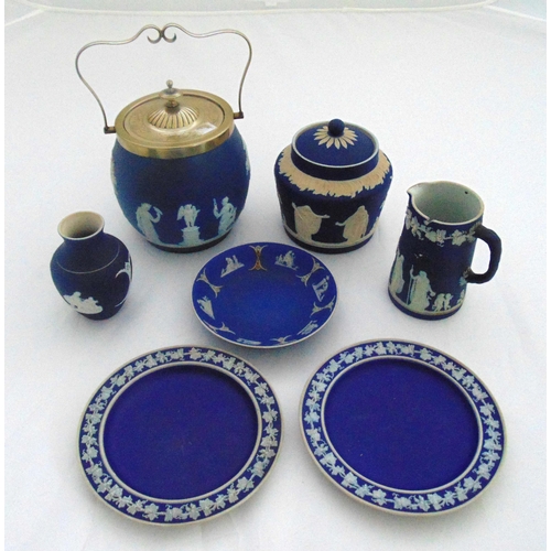 103 - A quantity of 19th century blue jasperware to include a biscuit jar with silver plated cover and swi... 