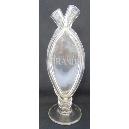 135 - A late 18th century double whiskey/brandy clear glass decanter on circular spreading base, 31.5cm (h... 