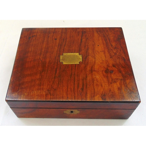 172 - A Victorian rectangular mahogany stationery box with hinged cover containing a collection matchbook ... 