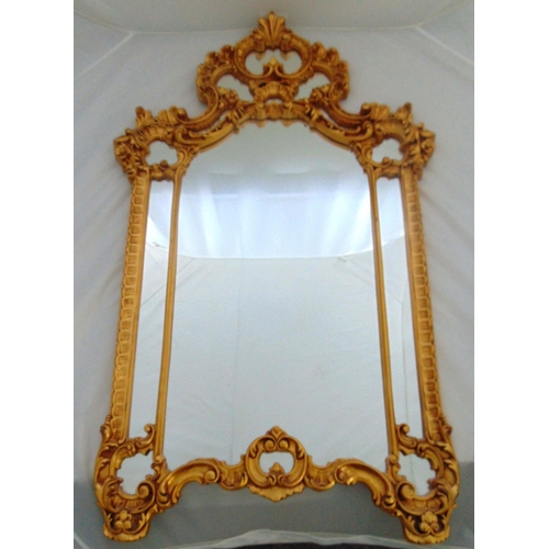 22 - A gilded wooden Baroque style rectangular wall mirror, 127 x 78cm