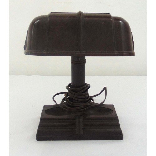 29 - An American Bakelite desk lamp shaped oval with cylindrical stem on raised rectangular base 25 x 20 ... 