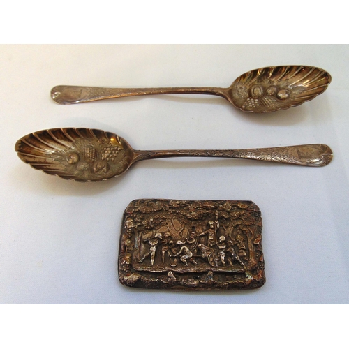 382 - Two hallmarked silver berry spoons and a white metal plaque depicting a triumphant procession, appro... 