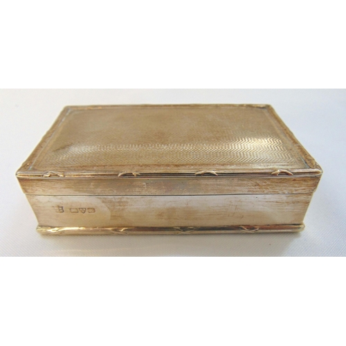 397 - A hallmarked silver rectangular engine turned table snuff box with reed and tie borders, Chester 190... 