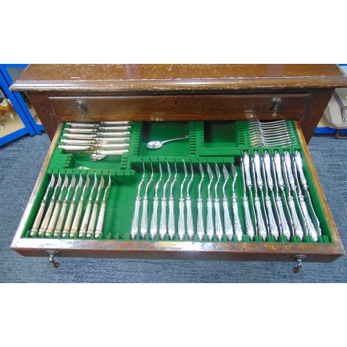 404 - A canteen of mixed silver plated flatware to include knives, forks, spoons, a white metal ladle stam... 