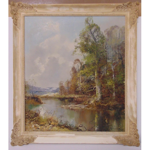 55 - A framed oil on canvas landscape with a lake, forest and mountains in the background, indistinctly s... 