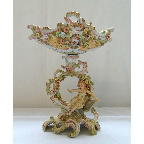 88 - A continental porcelain comport with applied figures flowers and leaves, 38.5cm (h)