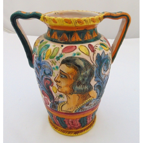 103 - A Majolica vase with two handles decorated with a ladies profile, flowers and leaves, 27cm (h)