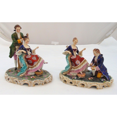 106 - A pair of 19th century Volkstedt Rudolstadt porcelain figurines of a seated lady having her hair and... 