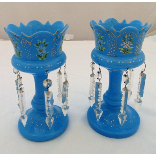 117 - A pair of Victorian blue glass lustres of crown shape on raised circular bases the sides painted wit... 