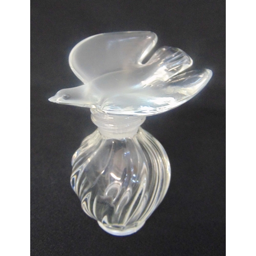 125 - Lalique frosted glass scent bottle of spirally fluted globular form with flying bird drop stopper, s... 