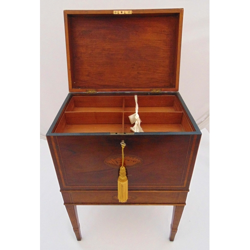 15 - An Edwardian mahogany sewing box on tapered legs, with hinged cover and side drawer, satinwood shell... 