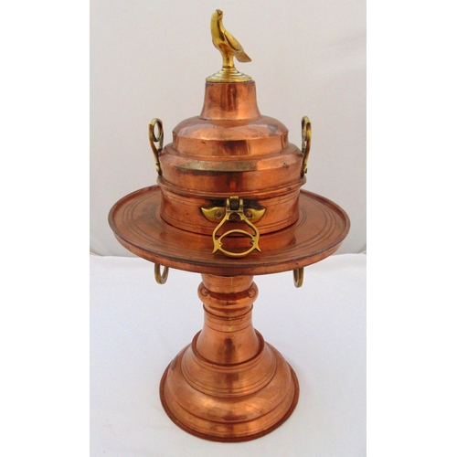 155 - An antique Middle Eastern brass and copper brazier on raised circular base, pierced and hinged brass... 