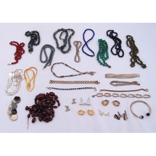 304 - A quantity of silver and costume jewellery to include necklaces, bracelets, earrings and cufflinks