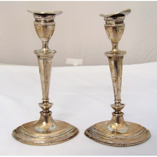 355 - A pair of Victorian Scottish hallmarked silver table candlesticks, tapering oval form on raised oval... 