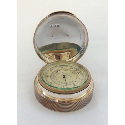 394 - Goldsmiths and Silversmiths hallmarked silver pocket barometer with hinged engine turned cover Londo... 