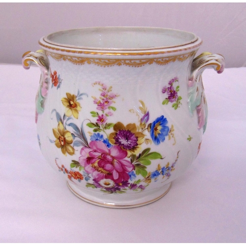 119 - Dresden plant pot holder decorated with flowers and leaves, marks to the base, 18 x 23cm