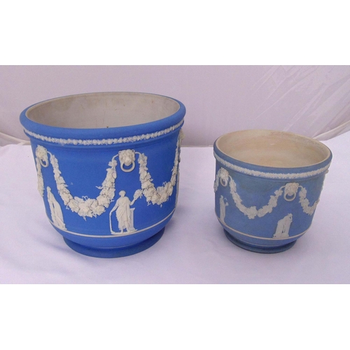 142 - Two Wedgwood Jasperware plant pot holders, marks to the bases, tallest 23cm (h)