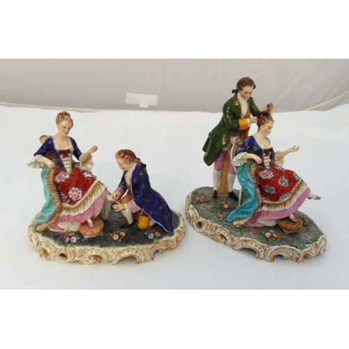 159 - A pair of 19th century Volkstedt Rudolstadt porcelain figurines of a seated lady having her hair and... 