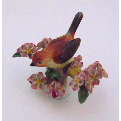 166 - Herend figurine of a bird and a branch with flowers and leaves, marks to the base, 10cm (h)